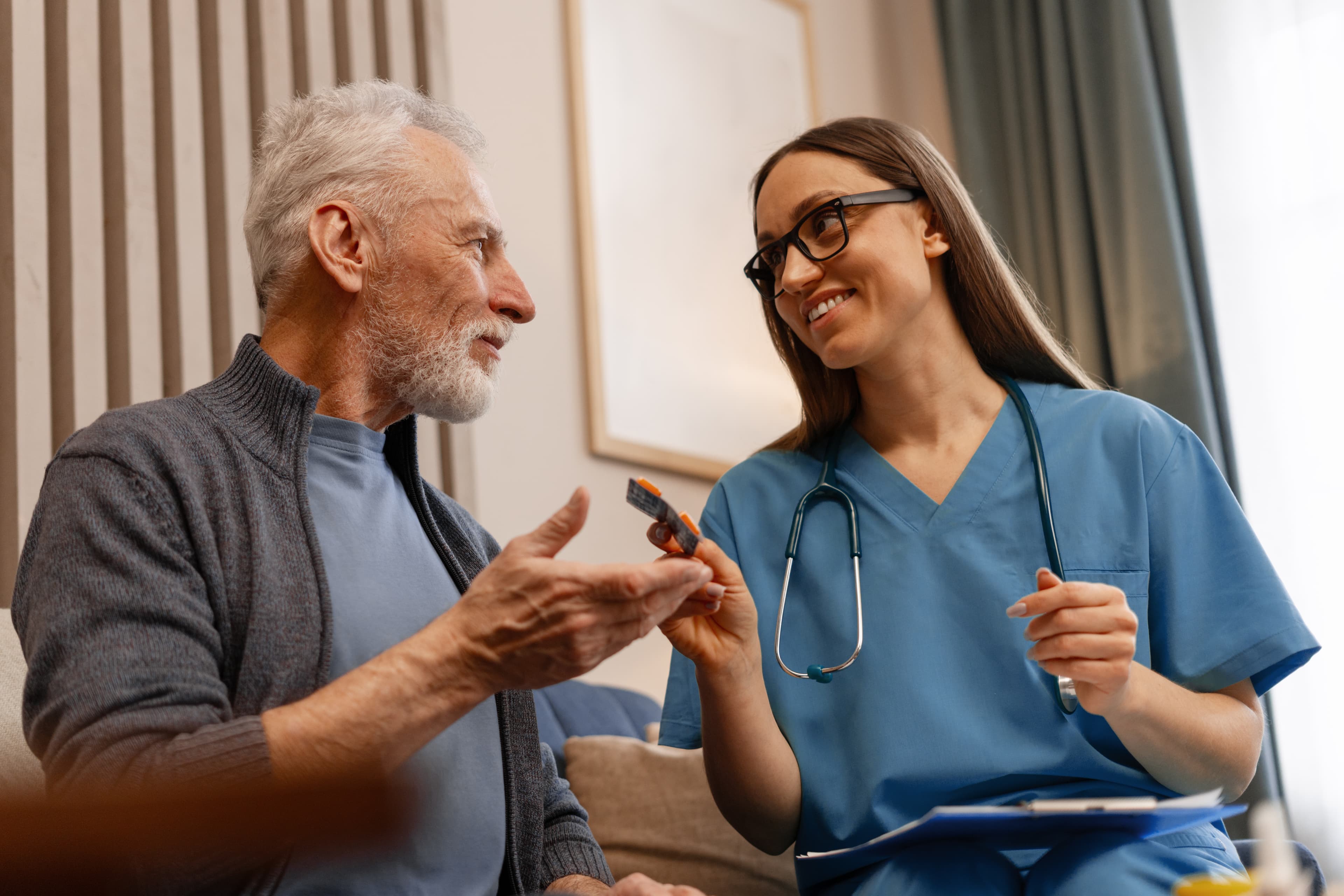 PMH-BC – Psychiatric Mental Health Nurse Board Certified PMH-BC (Psychiatric-Mental Health Nurse – Board Certified) exam information - a doctor explaining medication to a senior patient | Psychiatric Mental Health Review