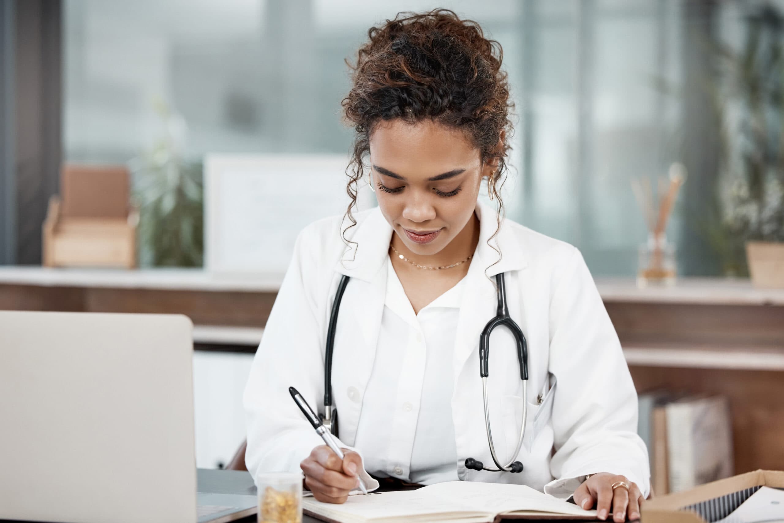 PMHS Certification Exam Preparation PMHS (Pediatric Primary Care Mental Health Specialist) exam prep - a pediatric mental health nurse educating a patient with a tablet | Psychiatric Mental Health Review
