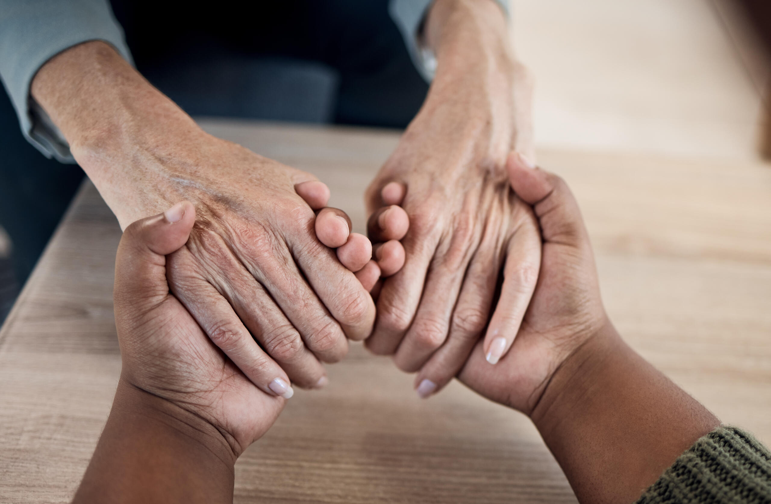 Refund Policy – PMH-BC, PMHNP-BC & PMHS Review Courses Psychiatric Mental Health Review - caregivers holding hands, offering compassionate support and trust to people in their care