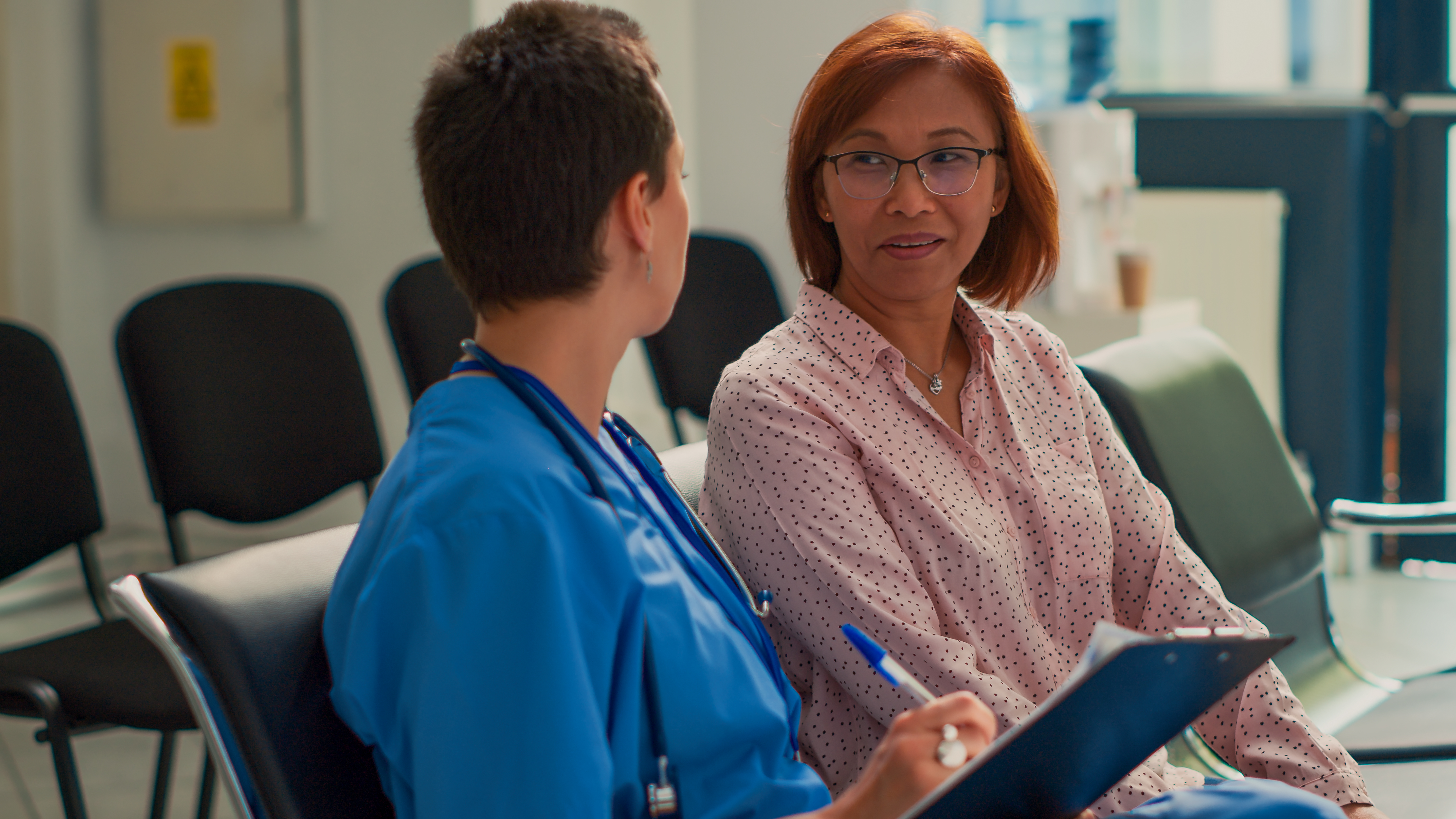 PMH-BC Recertification and Continuing Education Psychiatric Mental Health Review - a caring nurse talking with a patient in a waiting room, PMH-BC exam preparation